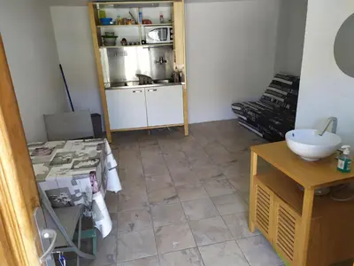 a bathroom with a sink and a counter at Studio a petit prix in Castellare-di-Mercurio