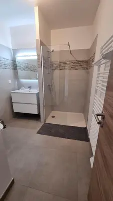 a bathroom with a shower and a sink at BELLE Demeure in Pietrosella