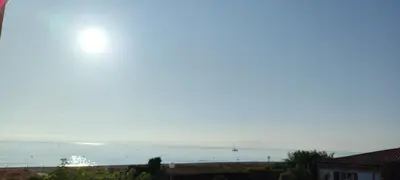 a view of the ocean from a house at Casa Di l'alba in Borgo