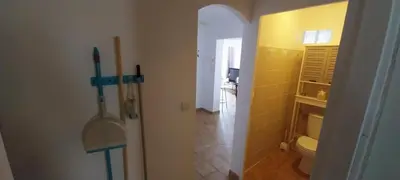 a bathroom with a shower and a toilet in a room at Agréable bas de villa in Furiani