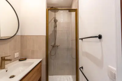a bathroom with a shower and a sink at Villa Rossa in Lecci