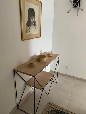 a table with bowls on it in a room at Pietrosella Bord de Mer in Pietrosella