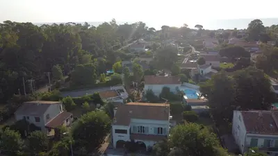 an aerial view of a suburb with houses at La parenthèse in Lucciana