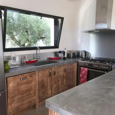 a kitchen with a sink and a window at Peaceful Villa Between Sea And Mountain In Corsica in Lecci