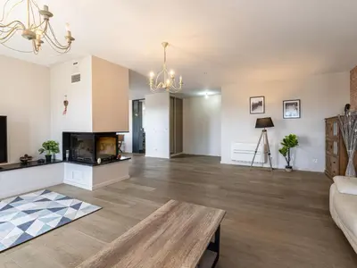 a living room with a couch and a table at Apartment La vallée by Interhome in Aléria