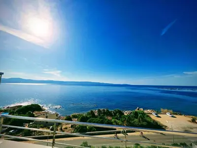 a view of a body of water with a beach at Cocon chaleureux bord de plage vue sanguinaire in Ajaccio