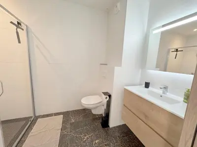 a bathroom with a toilet and a sink and a shower at La bella Vista di Civita de Pietrosella in Pietrosella