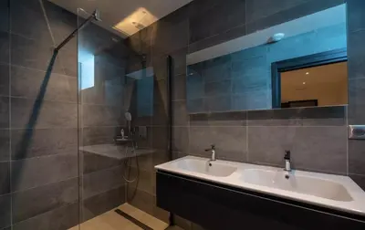 a bathroom with a sink and a mirror at Villa Bianca in Zonza