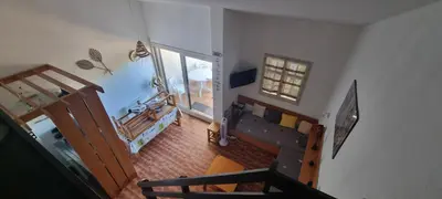 an overhead view of a living room with a couch at Maison porticcio vue mer chez Olivier in Grosseto-Prugna