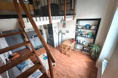 an overhead view of a kitchen and dining room with a ladder at Central studio in Ajaccio quiet and convenient in Ajaccio