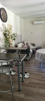 a living room with couches and a couch at Maison de vacances en Corse in Prunelli-di-Fiumorbo