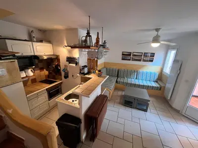 an aerial view of a kitchen and living room at ST CYPRIEN A6 5 pers à 250m de la plage de sable Saint Cyprien in Lecci