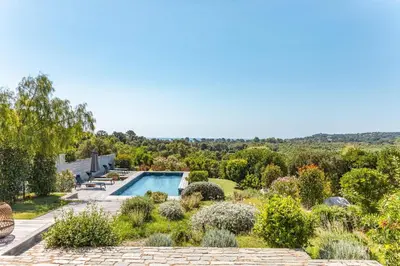an aerial view of a garden with a swimming pool at Villa Fautea Di Santa Lucia in Sainte-Lucie de Porto-Vecchio
