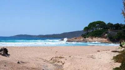 a sandy beach with the ocean in the background at Casa l'Ascosu 2 in Coggia