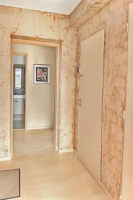 an empty room with an open door and a hallway at Evasion Méditerranée - Vue Mer in Ajaccio