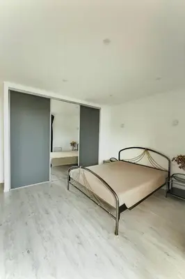 a bedroom with a bed in the middle of it at Evasion Méditerranée - Vue Mer in Ajaccio