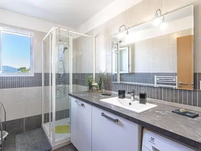 a bathroom with a sink and a shower at Apartment Albarella by Interhome in Vescovato