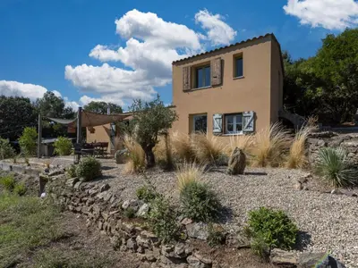 a house in the middle of a garden at Holiday Home Casa Murato by Interhome in San-Giuliano
