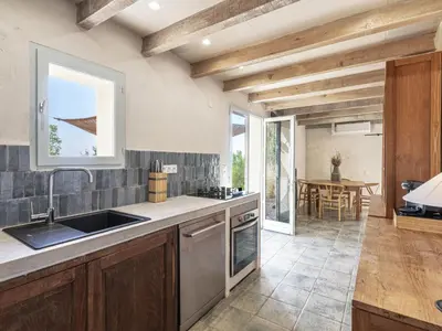a kitchen with a sink and a counter top at Holiday Home Casa Murato by Interhome in San-Giuliano