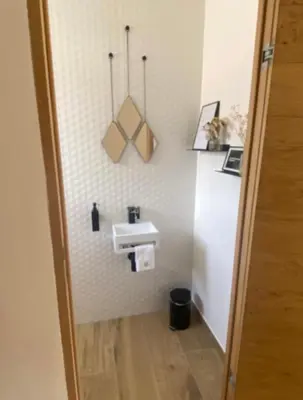 a bathroom with a sink in a room at Villa 4 chambres à Castirla in Castirla