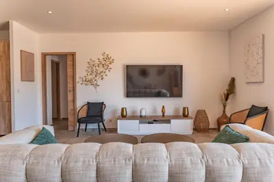 a living room with a couch and a table at Villa Felicita di Lecci in Lecci