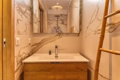 a bathroom with a sink and a mirror at Villa Felicita di Lecci in Lecci