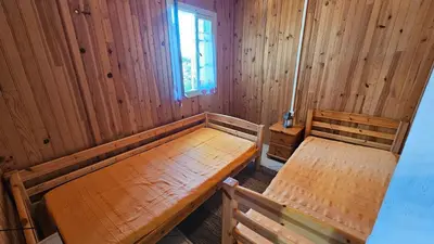 an overhead view of a room with two beds at CHALET BAVEDDA- Accès chemins de randonnée- Calme - Montagne in Quenza