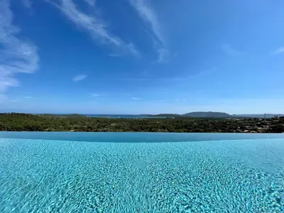 a view of a large body of blue water at Villa contemporaine ORIZONTE - 15 pers - 400m2 vue mer in Zonza