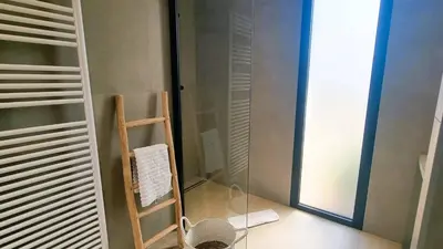 a glass room with a ladder and a glass window at Villa Juca, 10 pers, piscine chauffée, 10 minutes plage in Cirendinu