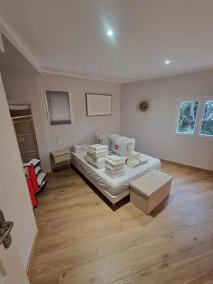 a bedroom with a bed in a room at appartement vezzani in Vezzani