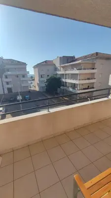 a view from the balcony of a building at Moriani-Plage 1-bedroom apartment in San-Nicolao