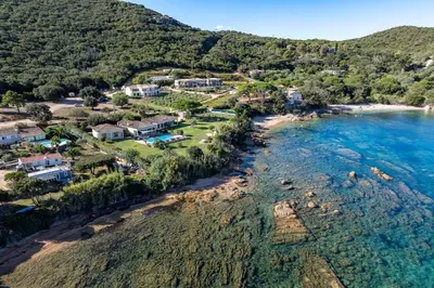 an aerial view of a resort on the beach at Villa Aigue Marine - Front de mer in Coti-Chiavari