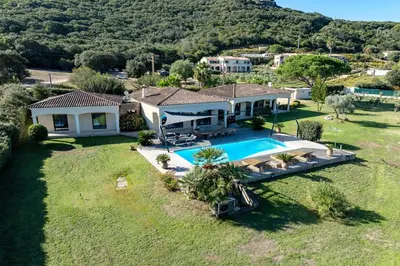 an aerial view of a house with a swimming pool at Villa Aigue Marine - Front de mer in Coti-Chiavari