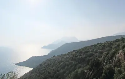 a view of a mountain with a body of water at Amazing Apartment In Partinello in Partinello