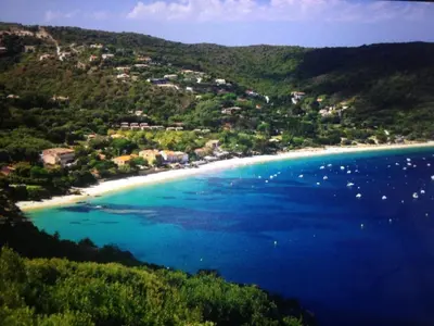 an aerial view of a beach with blue water at Villa de charme et plage 5 mn à pied in Campomoro