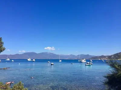 a large body of water with boats in it at Villa de charme et plage 5 mn à pied in Campomoro