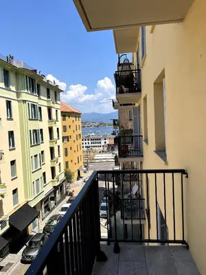a balcony of a building with a view of a street at Appartement Ajaccio in Ajaccio