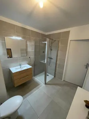 a bathroom with a shower and a sink at Charming Apartment Ajaccio in Ajaccio