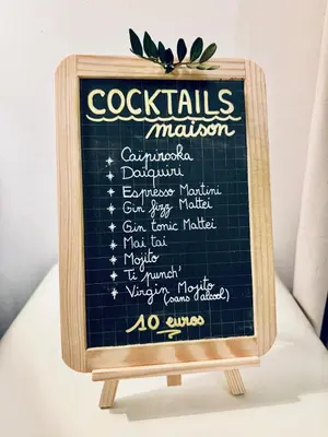 a chalkboard menu sign for a wedding reception at Casetta di Asciaghju, suite avec jacuzzi privé et accès direct aux plages in Porto-Vecchio