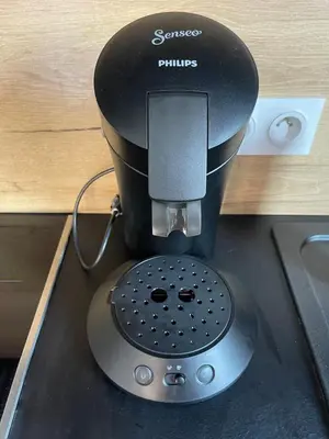 a black mixer sitting on top of a counter at Mini Villa - Les Hameaux de Saint Cyprien in Lecci