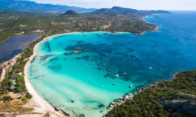 an aerial view of a beach with turquoise water at Mini Villa - Les Hameaux de Saint Cyprien in Lecci