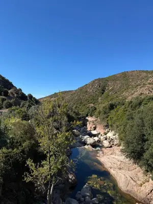 a river in the middle of a mountain at Casa di u Fiume in Peri