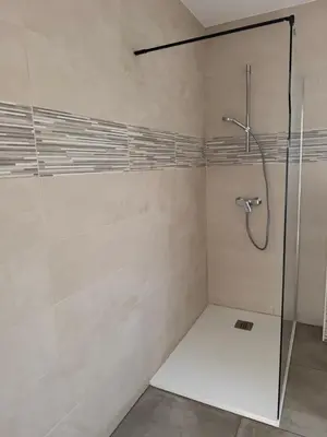 a shower with a glass door in a bathroom at Casa di u Fiume in Peri
