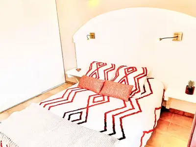 a living room with a couch with a blanket at Holiday Home Casa Orsoni 100m² by Interhome in Cannella