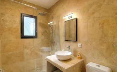 a bathroom with a sink and a shower at Villa With Pool Between Porto-Vecchio And Bonifacio in Sotta