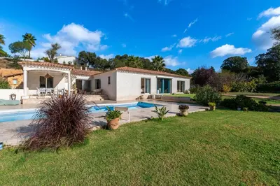 a villa with a swimming pool and a yard at Villa Valle Pace Maria - Piscine Privée in Afa