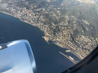 an aerial view of a city from an airplane at Marines de Moriani in Moriani Plage