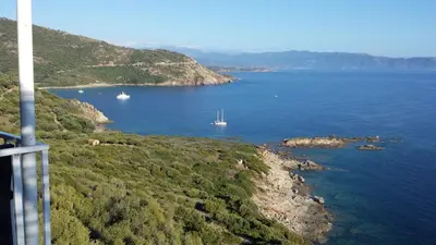a view of a bay with boats in the water at Bel Mare in Cargèse