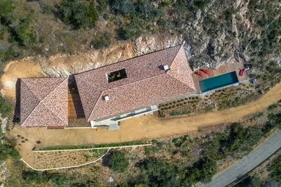 an overhead view of a house with a roof at Villa petra mare in Cargèse