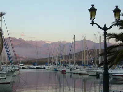 a bunch of boats are docked in a marina at Holiday apartment with 1 bedroom in Montegrosso